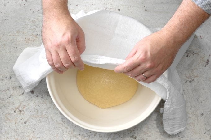 covering bread dough before proofing