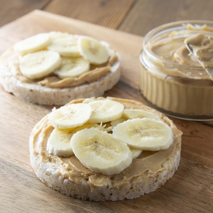 Peanut butter and banana on rice cakes, healthy, dietary food.