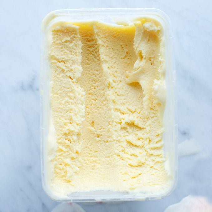 Dish Of Half Eaten Vanilla Ice Cream